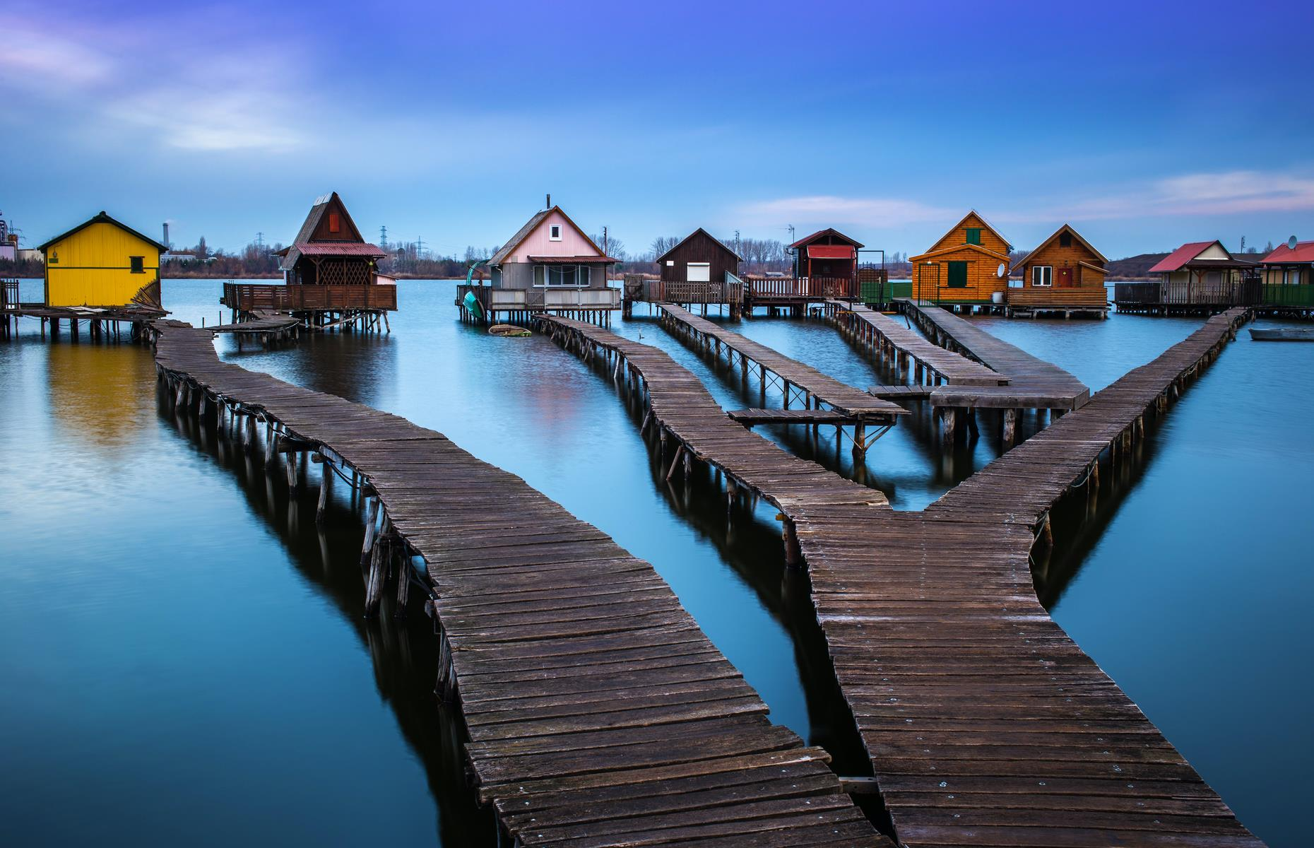 Bokodi Floating Village, Hungary: A unique water village known for its colorful floating houses and scenic lake views.