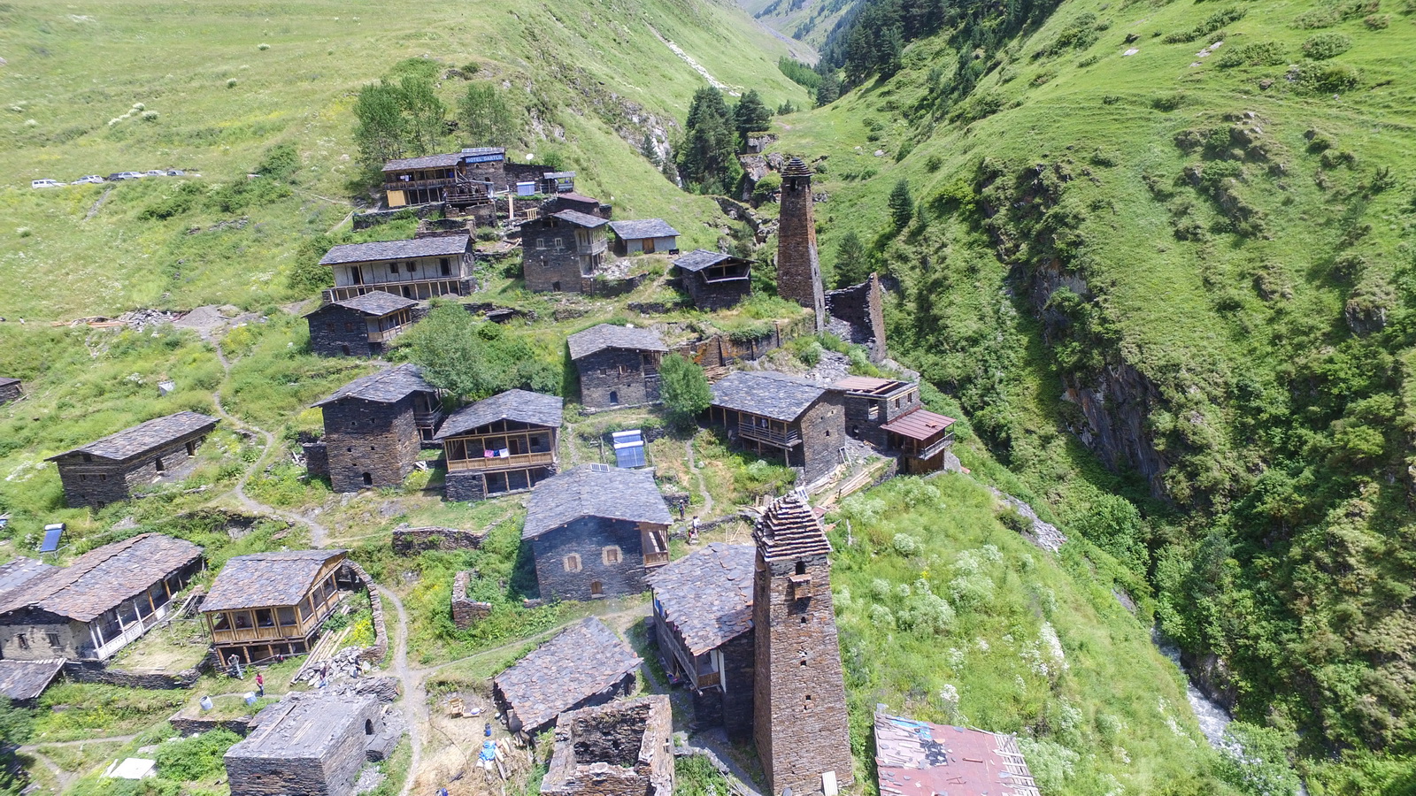 Dartlo, Georgia: A remote village in the Caucasus Mountains known for its traditional stone towers and stunning mountain views.