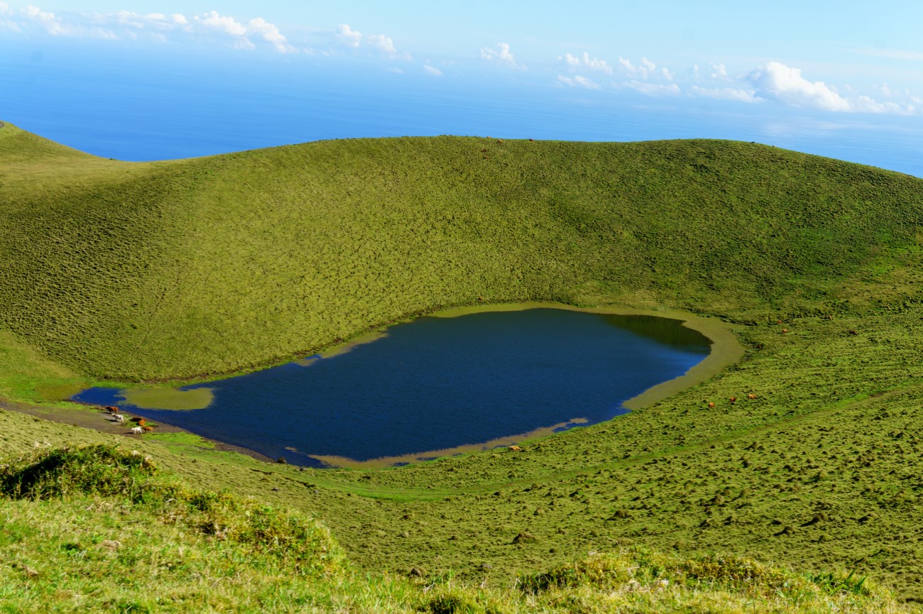 Pico Island, Azores, Portugal: A stunning volcanic island known for its rugged landscapes, vineyards, and the highest peak in Portugal, Mount Pico.